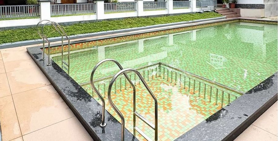 Pool area at Jeevika Haven during the day